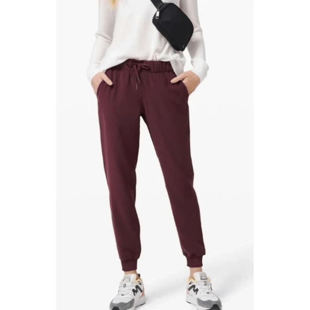 Lululemon On The Fly Jogger Pants Woven Cassis Burgundy Maroon Size 10